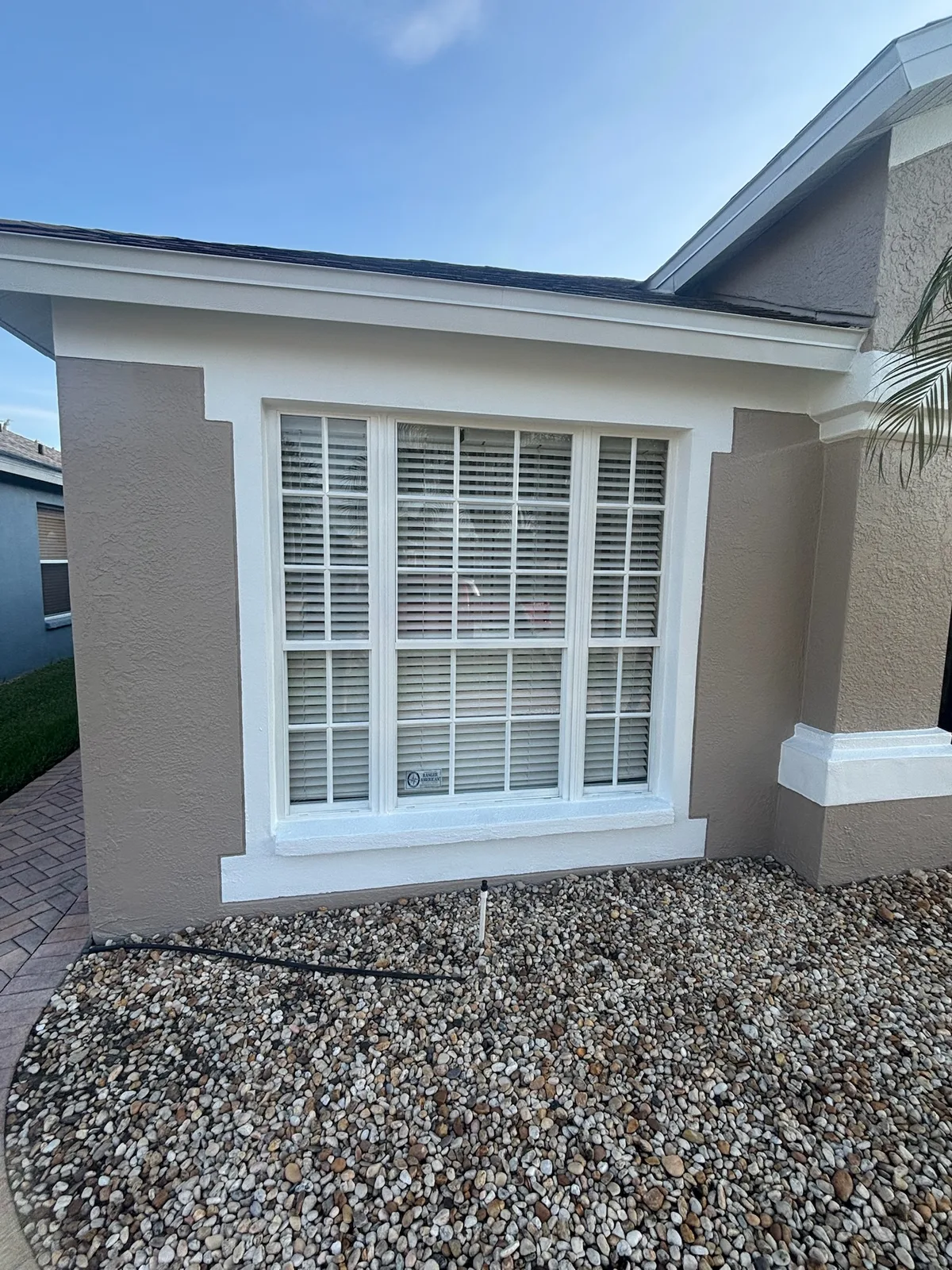 Exterior home after repainting and trim work