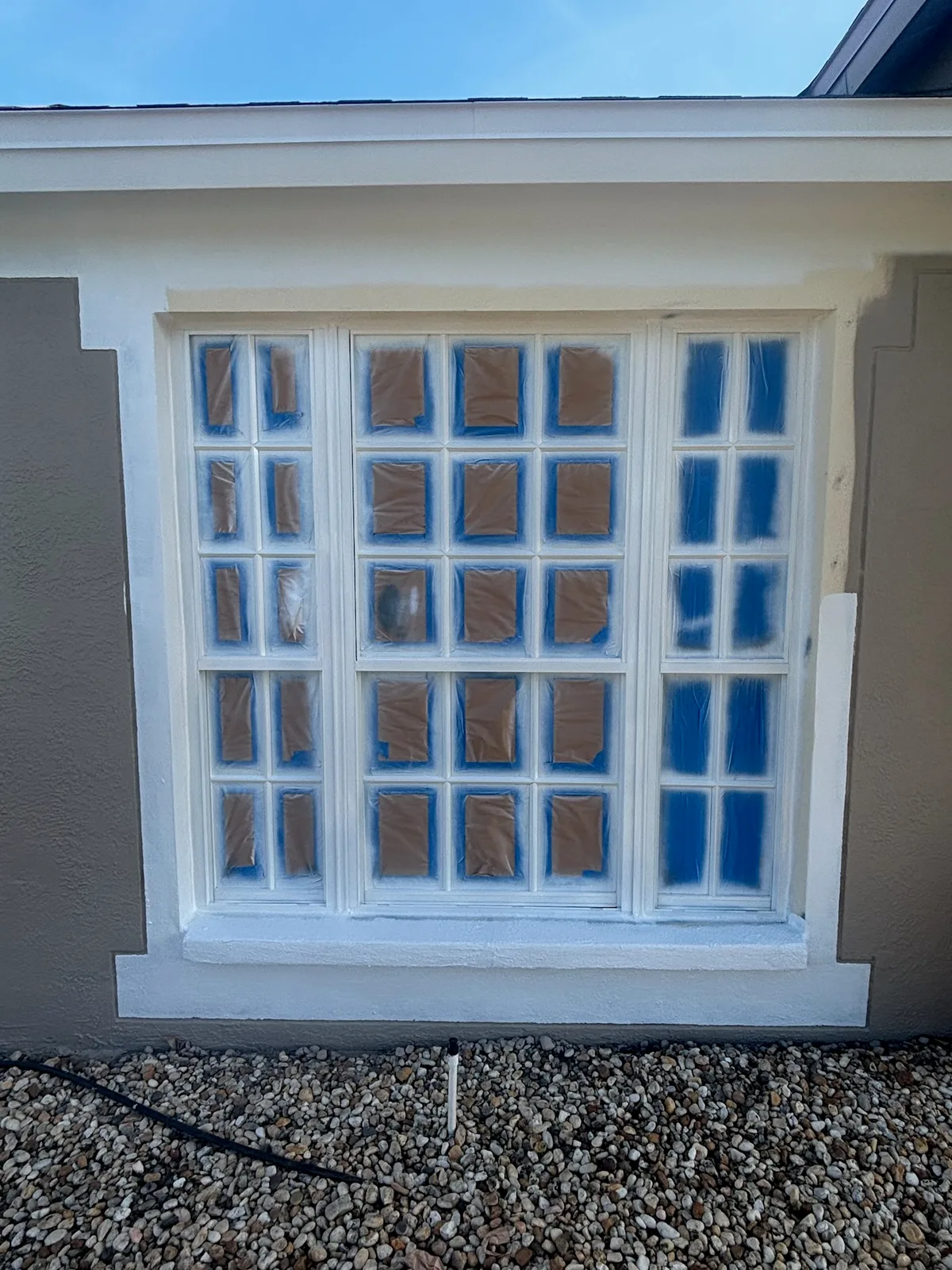 Exterior home during repainting work