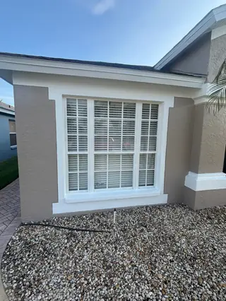 Exterior home after repainting and trim work